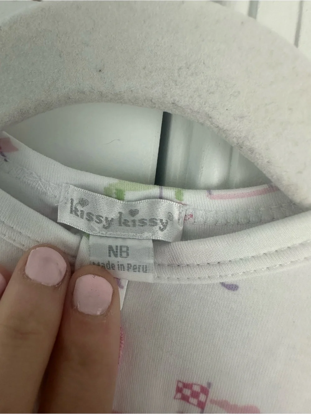 Kissy Kissy NB Golf print sleeper like new